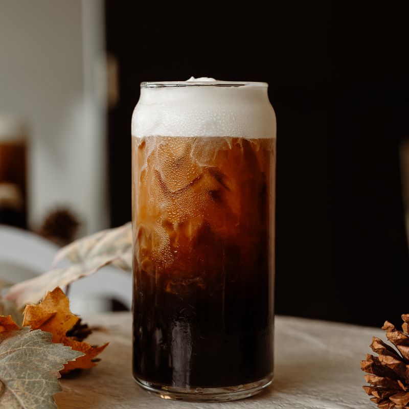 Pumpkin Pie Cold Brew with fall leaves