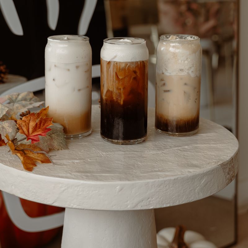 The three fall drinks on a pedestal by the mascot wall